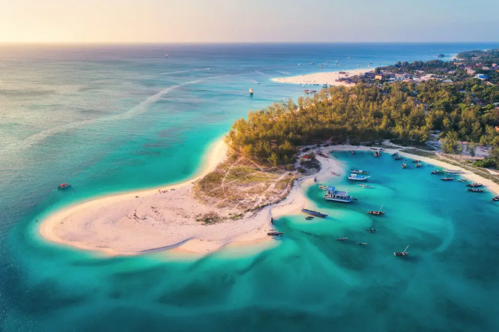 Fishing boats on turquoise water near Zanzibar